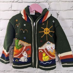 Kids Wool blend embroidered sweater made in peru. Green/animals size 2
